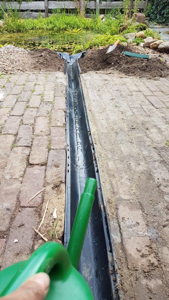 Met de gieter testen of het wel voldoende afloopt